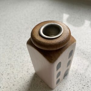 Wooden Candle Stick Holder shaped like a house finished in Pale Pink Colour with Black Windows